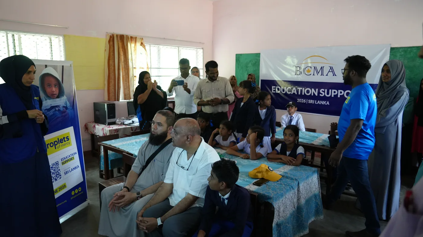 Droplets of Mercy Education Support event with students and families in a Sri Lankan classroom